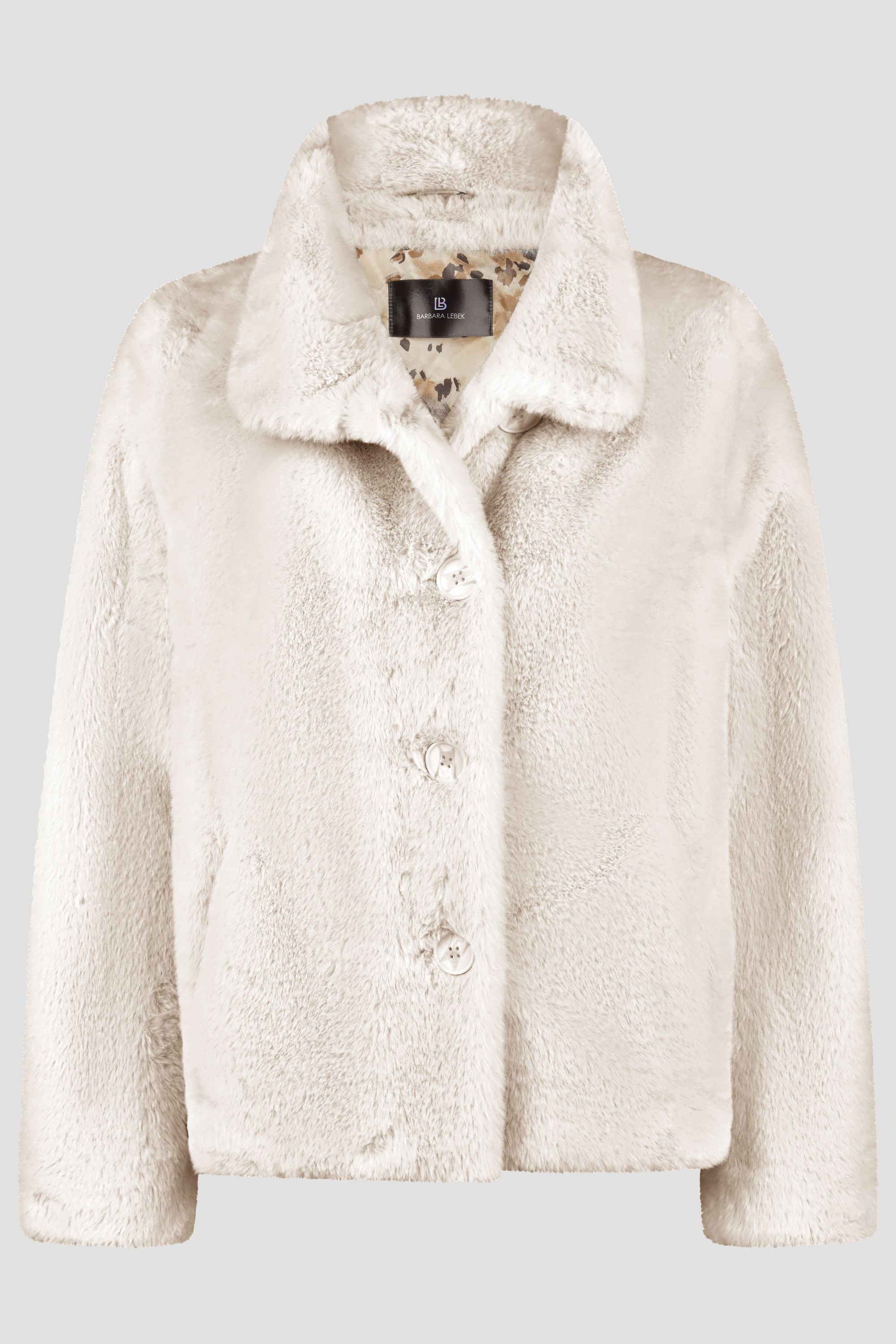 Damen Fellimitatjacke in Beige mit Knöpfen. 